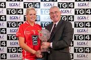 25 September 2011; Angela Walsh, Cork, is presented with the player of the match award by Padhraic O Ciardha, TG4. TG4 All-Ireland Ladies Senior Football Championship Final, Cork v Monaghan, Croke Park, Dublin. Picture credit: Pat Murphy / SPORTSFILE