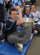 26 September 2011; Philip McCormack with the Sam Maguire cup during the visit of Dublin captain Bryan Cullen to St Michaels House Special National School. Golf Links Road, Hacketstown, Skerries, Dublin. Photo by Sportsfile