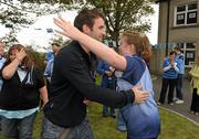 26 September 2011; Dublin captain Bryan Cullen gets a hug from his neighbour Deirdre Walsh during his visit to St Michaels House Special National School. Golf Links Road, Hacketstown, Skerries, Dublin. Photo by Sportsfile