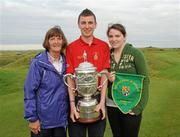 15 September 2011; Sean Lane, centre, Mitchelstown Golf Club, Co. Cork, along with his grandmother Betty Hennessy, left, and sister Ciara Lane, holding the Junior Cup, after beating Lurgan Golf Club, Co. Armagh, in the final. Chartis Cups and Shields Finals 2011, Castlerock Golf Club, Co. Derry. Picture credit: Oliver McVeigh / SPORTSFILE