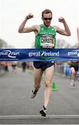 9 April 2017; Mark Christie of Ireland celebrates as he crosses the finish line to win the Elite Men's Great Ireland Run at Phoenix Park, in Dublin. Photo by Seb Daly/Sportsfile