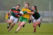 9 April 2017; Shannon McGroddy of Donegal in action against Doireann Hughes, right, and Martha Carter of Mayo during the Lidl Ladies Football National League Division 1 Refixture match between Donegal and Mayo at St Mary's GAA Club, in Convoy, Co. Donegal. Photo by Sam Barnes/Sportsfile