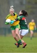9 April 2017; Tresea Doherty of Donegal in action against Orla Conlon of Mayo during the Lidl Ladies Football National League Division 1 Refixture match between Donegal and Mayo at St Mary's GAA Club, in Convoy, Co. Donegal. Photo by Sam Barnes/Sportsfile