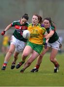 9 April 2017; Shannon McGroddy of Donegal in action against Doireann Hughes, right, and Martha Carter of Mayo during the Lidl Ladies Football National League Division 1 Refixture match between Donegal and Mayo at St Mary's GAA Club, in Convoy, Co. Donegal.  Photo by Sam Barnes/Sportsfile