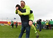 9 April 2017; Evergreen FC player manager Parick Holden celebrates with a supporter at the end of  the FAI Junior Cup Semi Final match in association with Aviva and Umbro between Boyle Celtic and Evergreen FC at The Showgrounds, in Sligo. Photo by David Maher/Sportsfile