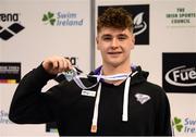 9 April 2017; Conor Ferguson of Bangor Swim Club, Co. Down, hold up his winner's medal after winning the Men's 50m Backstroke during the 2017 Irish Open Swimming Championships at the National Aquatic Centre in Dublin. Photo by Seb Daly/Sportsfile
