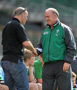 27 September 2011; Ireland head coach Declan Kidney meets former Munster centre Mike Mullins during squad training ahead of their 2011 Rugby World Cup, Pool C, game against Italy on Sunday. Ireland Rugby Squad Training, Carisbrook Stadium, Dunedin, New Zealand. Picture credit: Brendan Moran / SPORTSFILE