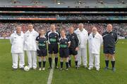 25 September 2011; Referee John Niland, with his linespeople Leah Mullins, left, and Niamh Fallon, umpires, from left, Terence McShea, James Finan, Kevin Maye and Tommy Lyons and 4th official Keith Delahunty, right. TG4 All-Ireland Ladies Senior Football Championship Final, Cork v Monaghan, Croke Park, Dublin. Photo by Sportsfile