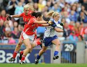 25 September 2011; Ciara  McAnespie, Monaghan, in action against Brid Stack, left, and Geraldine O'Flynn, Cork. TG4 All-Ireland Ladies Senior Football Championship Final, Cork v Monaghan, Croke Park, Dublin. Picture credit: Brian Lawless / SPORTSFILE