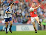 25 September 2011; Nollaig Cleary, Cork, in action against Therese McNally, Monaghan. TG4 All-Ireland Ladies Senior Football Championship Final, Cork v Monaghan, Croke Park, Dublin. Picture credit: Brian Lawless / SPORTSFILE