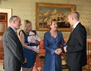 27 September 2011; Dublin's Eoghan O'Gara, his girlfriend Elaine Banville and their two week old daughter Ella, with President Mary McAleese and her husband Senator Martin McAleese during the All-Ireland Football Champions visit to Áras an Uachtaráin, Phoenix Park, Dublin. Picture credit: Ray McManus / SPORTSFILE
