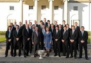 27 September 2011; The Dublin captain Bryan Cullen, manager Pat Gilroy, Chief Executive John Costello, Chairman Andy Kettle, players, and coaching staff with President Mary McAleese and her husband Senator Martin McAleese and the Sam Maguire Cup during the All-Ireland Football Champions visit to Áras an Uachtaráin, Phoenix Park, Dublin. Picture credit: Ray McManus / SPORTSFILE