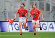 25 September 2011; Cork players Geraldine O'Flynn, left, and Mairead Kelly, celebrate after the match. TG4 All-Ireland Ladies Senior Football Championship Final, Cork v Monaghan, Croke Park, Dublin. Picture credit: Brian Lawless / SPORTSFILE