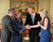 27 September 2011; Dublin's Eoghan O'Gara and his girlfriend Elaine Banville with President Mary McAleese and her husband Senator Martin McAleese during the All-Ireland Football Champions visit to Áras an Uachtaráin, Phoenix Park, Dublin. Picture credit: Ray McManus / SPORTSFILE