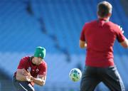 28 September 2011; Ireland scrum-half Conor Murray passes to team-mate Ronan O'Gara during squad training ahead of their 2011 Rugby World Cup, Pool C, game against Italy on Sunday. Ireland Rugby Squad Training, Carisbrook Stadium, Dunedin, New Zealand. Picture credit: Brendan Moran / SPORTSFILE