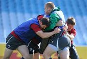 28 September 2011; Ireland's Tom Court is tackled by Jonathan Sexton, left, and Ronan O'Gara during squad training ahead of their 2011 Rugby World Cup, Pool C, game against Italy on Sunday. Ireland Rugby Squad Training, Carisbrook Stadium, Dunedin, New Zealand. Picture credit: Brendan Moran / SPORTSFILE