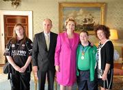 28 September 2011; Special Olympics athlete Joseph Cullen, from Strandill, Co. Sligo, and family members Joanne Keegan, left, and Martina Cullen, with President Mary McAleese and her husband Senator Martin McAleese at a reception for the Special Olympics World Summer Games squad in Aras an Uachtarain, Phoenix Park, Dublin. Picture credit: Ray McManus / SPORTSFILE