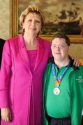 28 September 2011; Special Olympics athlete Joseph Cullen, from Strandill, Co. Sligo, with President Mary McAleese at a reception for the Special Olympics World Summer Games squad in Aras an Uachtarain, Phoenix Park, Dublin. Picture credit: Ray McManus / SPORTSFILE