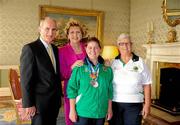 28 September 2011; Special Olympics athlete Aisling Beacom, from Wicklow, Co. Wicklow, and her coach Pam Beacom, with President Mary McAleese and her husband Senator Martin McAleese at a reception for the Special Olympics World Summer Games squad in Aras an Uachtarain, Phoenix Park, Dublin. Picture credit: Ray McManus / SPORTSFILE