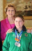 28 September 2011; Special Olympics athlete Aisling Beacom, from Wicklow Town, Co. Wicklow, with President Mary McAleese at a reception for the Special Olympics World Summer Games squad in Aras an Uachtarain, Phoenix Park, Dublin. Picture credit: Ray McManus / SPORTSFILE