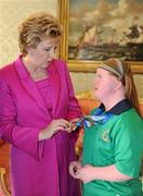 28 September 2011; Special Olympics athlete Ciara O'Loughlin, from Inagh, Co. Clare, with President Mary McAleese at a reception for the Special Olympics World Summer Games squad in Aras an Uachtarain, Phoenix Park, Dublin. Picture credit: Ray McManus / SPORTSFILE