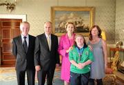 28 September 2011; Special Olympics athlete Ciara O'Loughlin, from Inagh, Co. Clare, and her Mam Colette O'Loughlin, right, and Dad Malachy O'Loughlin, with President Mary McAleese and her husband Senator Martin McAleese at a reception for the Special Olympics World Summer Games squad in Aras an Uachtarain, Phoenix Park, Dublin. Picture credit: Ray McManus / SPORTSFILE