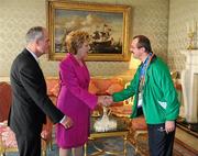 28 September 2011; Special Olympics athlete Adrian Cornwall, from Tonphubble, Co. Sligo, with President Mary McAleese and her husband Senator Martin McAleese at a reception for the Special Olympics World Summer Games squad in Aras an Uachtarain, Phoenix Park, Dublin. Picture credit: Ray McManus / SPORTSFILE