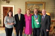 28 September 2011; Special Olympics athlete Adrian Cornwall, from Tonphubble, Co. Sligo, and family members Pauline Monaghan, left, and Ger Quinlivan, with President Mary McAleese and her husband Senator Martin McAleese at a reception for the Special Olympics World Summer Games squad in Aras an Uachtarain, Phoenix Park, Dublin. Picture credit: Ray McManus / SPORTSFILE
