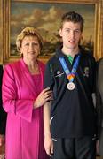 28 September 2011; Special Olympics athlete Gary Cunningham, from Oranmore, Co. Galway, with President Mary McAleese at a reception for the Special Olympics World Summer Games squad in Aras an Uachtarain, Phoenix Park, Dublin. Picture credit: Ray McManus / SPORTSFILE