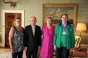 28 September 2011; Special Olympics athlete Paul Bridgeman, from Cobh, Co. Cork, and Siobhan Bridgeman with President Mary McAleese and her husband Senator Martin McAleese at a reception for the Special Olympics World Summer Games squad in Aras an Uachtarain, Phoenix Park, Dublin. Picture credit: Ray McManus / SPORTSFILE