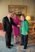 28 September 2011; Special Olympics athlete Steven Yetman, from Donaghadee, Co. Down, with President Mary McAleese and her husband Senator Martin McAleese at a reception for the Special Olympics World Summer Games squad in Aras an Uachtarain, Phoenix Park, Dublin. Picture credit: Ray McManus / SPORTSFILE