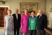 28 September 2011; Special Olympics athlete Steven Yetman, from Donaghadee, Co. Down, and family members Barrie Yetman, right, and Hannah Yetman, with President Mary McAleese and her husband Senator Martin McAleese at reception for the Special Olympics World Summer Games squad in Aras an Uachtarain, Phoenix Park, Dublin. Picture credit: Ray McManus / SPORTSFILE