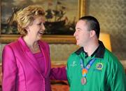 28 September 2011; Special Olympics athlete Shaun Bradley, from Letterkenny, Co. Donegal, with President Mary McAleese at a reception for the Special Olympics World Summer Games squad in Aras an Uachtarain, Phoenix Park, Dublin. Picture credit: Ray McManus / SPORTSFILE
