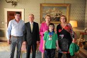 28 September 2011; Special Olympics athlete Laura Rumbell, from Dun Laoghaire, Co. Dublin, and family members Arthur Rumball, left, and Amanda Mollard, with President Mary McAleese and her husband Senator Martin McAleese at a reception for the Special Olympics World Summer Games squad in Aras an Uachtarain, Phoenix Park, Dublin. Picture credit: Ray McManus / SPORTSFILE