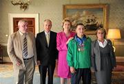 28 September 2011; Special Olympics athlete John Michael Gannon, from Cloghan, Co. Offaly, and family members Christy Gannon, left, and Patricia Gannon, with President Mary McAleese and her husband Senator Martin McAleese at a reception for the Special Olympics World Summer Games squad in Aras an Uachtarain, Phoenix Park, Dublin. Picture credit: Ray McManus / SPORTSFILE