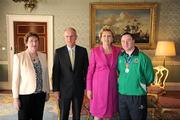 28 September 2011; Special Olympics athlete Shaun Bradley, from Letterkenny, Co. Donegal, and family member Jennie Bradley, with President Mary McAleese and her husband Senator Martin McAleese at reception for the Special Olympics World Summer Games squad in Aras an Uachtarain, Phoenix Park, Dublin. Picture credit: Ray McManus / SPORTSFILE