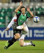 28 September 2011; Sara Lawlor, Peamount United FC, is tackled by Sabrina Delannoy, Paris St Germain. UEFA Women's Champions League Round of 32, Peamount United FC v Paris St Germain, Tallaght Stadium, Tallaght, Dublin. Picture credit: David Maher / SPORTSFILE