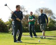29 September 2011; Ireland's Shane Jennings reacts to his drive at the 1st tee box, watched by playing partners Brian O'Driscoll and Andrew Trimble, during a round of golf on squad activity day ahead of their 2011 Rugby World Cup, Pool C, game against Italy on Sunday. Ireland Rugby Squad Activity Day, St Clair Golf Club, St Clair, Dunedin, New Zealand. Picture credit: Brendan Moran / SPORTSFILE