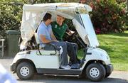 29 September 2011; Ireland's Rob Kearney and Brian O'Driscoll drive down the course in a buggy during a round of golf on squad activity day ahead of their 2011 Rugby World Cup, Pool C, game against Italy on Sunday. Ireland Rugby Squad Activity Day, St Clair Golf Club, St Clair, Dunedin, New Zealand. Picture credit: Brendan Moran / SPORTSFILE