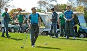 29 September 2011; Ireland's Ronan O'Gara reacts to his drive off the 1st tee box, with team-mates Denis Leamy, Brian O'Driscoll, Jonathan Sexton, Cian Healy and Donnacha Ryan, during a round of golf on squad activity day ahead of their 2011 Rugby World Cup, Pool C, game against Italy on Sunday. Ireland Rugby Squad Activity Day, St Clair Golf Club, St Clair, Dunedin, New Zealand. Picture credit: Brendan Moran / SPORTSFILE
