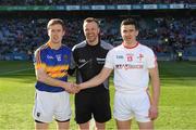 8 April 2017; Tipperary captain Brian Fox and Louth captain Adrian Reid shake hands accross referee Anthony Nolan before the Allianz Football League Division 3 Final match between Louth and Tipperary at Croke Park in Dublin. Photo by Ray McManus/Sportsfile