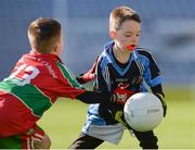 10 April 2017; Kaelum Macghib of Na Gaeil Óga, Co Dublin, in action against Ben Burgess of Ballymun, Co Dublin, during the The Go Games Provincial Days in partnership with Littlewoods Ireland  - Day 1 at Croke Park in Dublin. Photo by Sam Barnes/Sportsfile