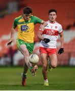 10 April 2017; Daire O'Baoilll of Donegal in action against Jordan Curran of Derry during the EirGrid Ulster GAA Football U21 Championship Final match between Derry and Donegal at Athletic Grounds in Armagh. Photo by Philip Fitzpatrick/Sportsfile