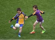 11 April 2017; Sean Little, representing St Mochtas GAA Club, Co. Louth, in action against James Lynch, representing Wolftones GAA Club, Co. Meath, during the The Go Games Provincial Days in partnership with Littlewoods Ireland Day 2 at Croke Park in Dublin. Photo by Cody Glenn/Sportsfile