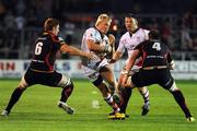 30 September 2011; Ulster's Luke Marshall, supported by team-mate Nigel Brady, is tackled by Andrew Coombs, left, and Adam Jones, Dragons. Celtic League, Dragons v Ulster, Rodney Parade, Newport, Wales. Picture credit: Ian Cook / SPORTSFILE