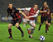 30 September 2011; Daniel North, St. Patrick's Athletic, in action against Aiden Price, Bohemians. Airtricity League Premier Division, Bohemians v St. Patrick's Athletic, Dalymount Park, Dublin. Picture credit: David Maher / SPORTSFILE