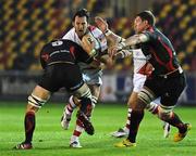 30 September 2011; Ulster's Pedrie Wannenburg is tackled by Dragon's Robert Sidoli. Celtic League, Dragons v Ulster, Rodney Parade, Newport, Wales. Picture credit: Ian Cook / SPORTSFILE