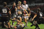 30 September 2011; Ulster's Adam D'Arcy breaks through the Dragon's defence. Celtic League, Dragons v Ulster, Rodney Parade, Newport, Wales. Picture credit: Ian Cook / SPORTSFILE