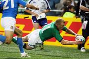 2 October 2011; Keith Earls, Ireland, goes over to score a try against Italy. 2011 Rugby World Cup, Pool C, Ireland v Italy, Otago Stadium, Dunedin, New Zealand. Picture credit: Dianne Manson / SPORTSFILE