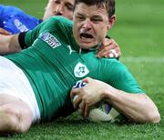 2 October 2011; Brian O'Driscoll, Ireland, goes over to score a try against Italy. 2011 Rugby World Cup, Pool C, Ireland v Italy, Otago Stadium, Dunedin, New Zealand. Picture credit: Dianne Manson / SPORTSFILE